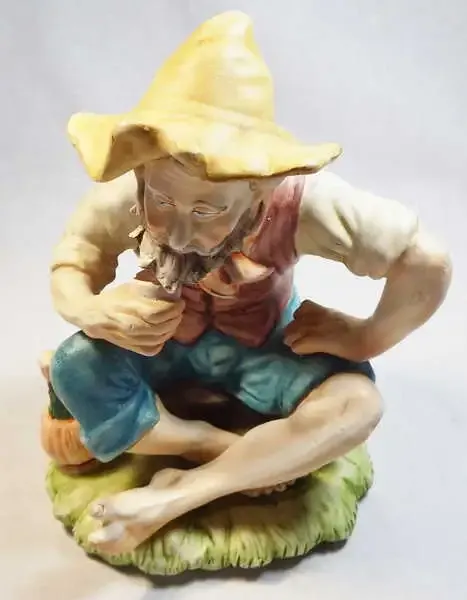 Hobo drinking wine porcelain figurine