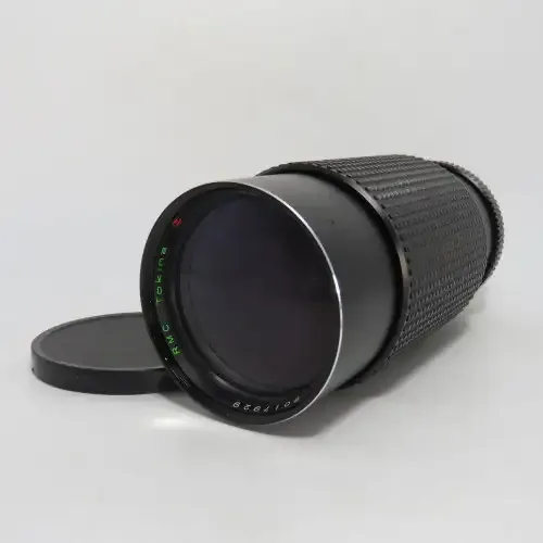 Vintage RMC Tokina 1:3,5 70-210mm camera lens - Lens is clean - P/K mount