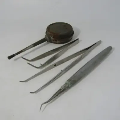 Vintage lot of dentist tools and syringes