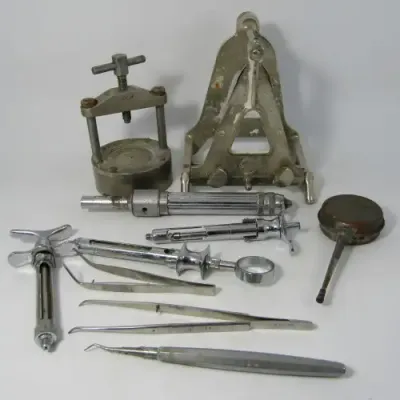 Vintage lot of dentist tools and syringes
