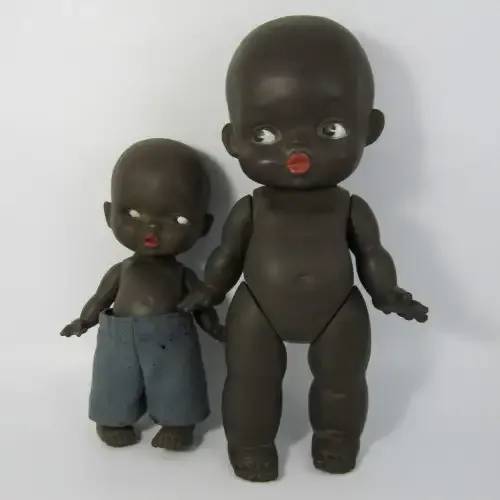 Pair of vintage African rubber dolls
