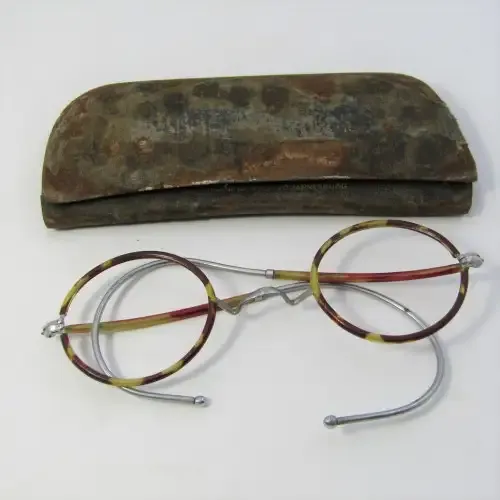 Antique glasses frame in original pouch