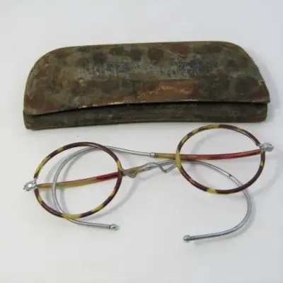 Antique glasses frame in original pouch