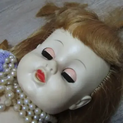 Rubber doll with closing eyes - 56cm