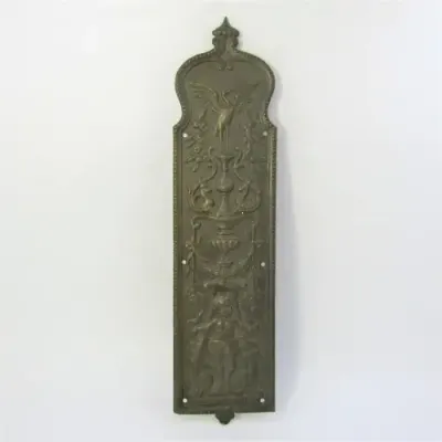 Vintage brass Stork and Baby themed door decor piece