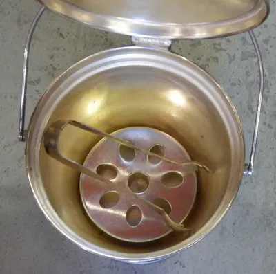 Vintage Emess silverplated ice bucket with tongs and strainer