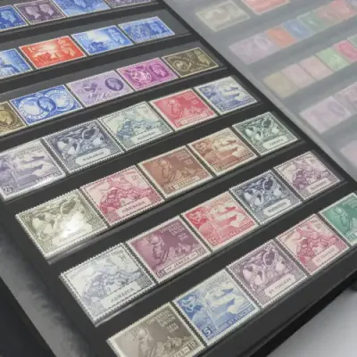 Stamp album with over 1070 stamps - England Jersey Isle of man Gibraltar mint and used