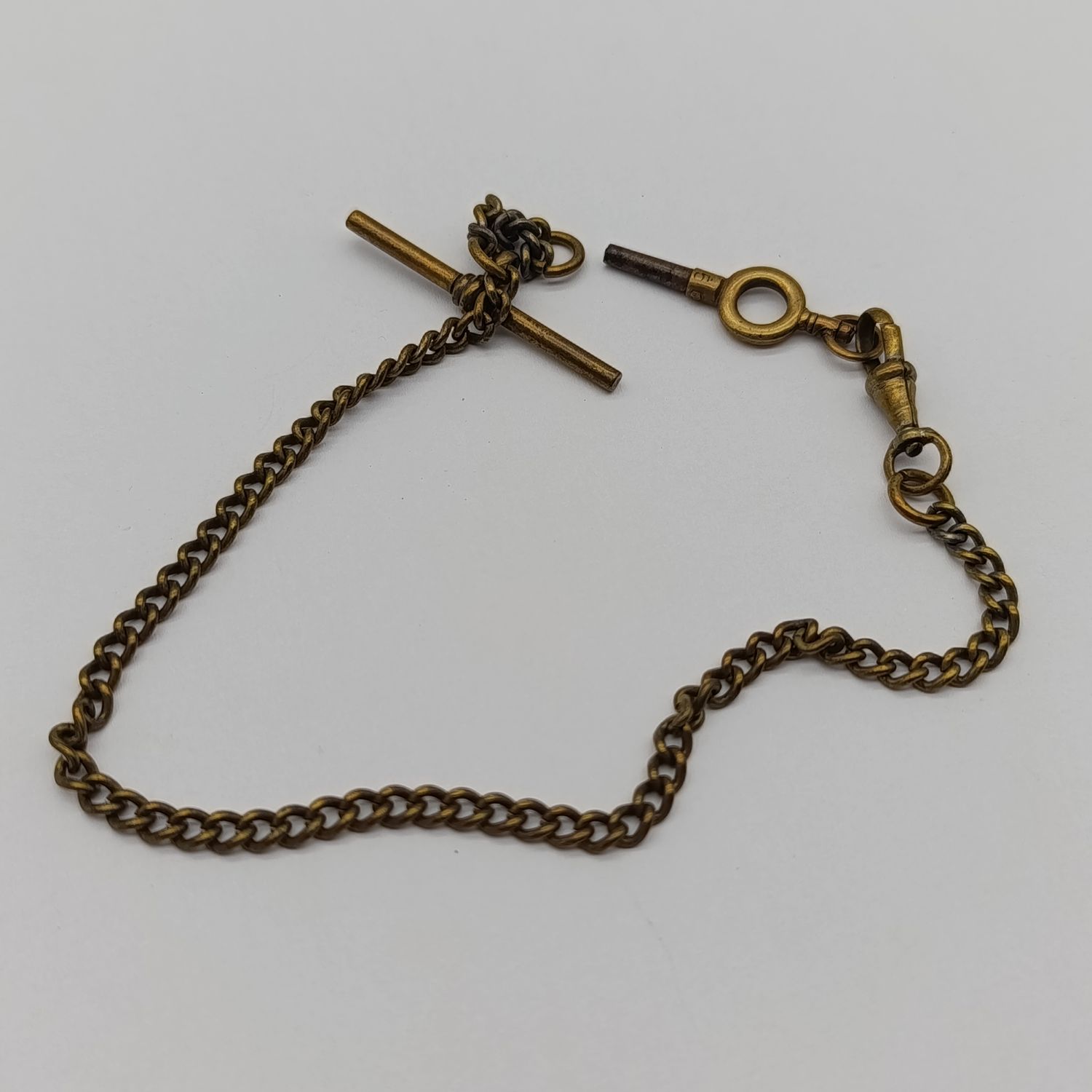 Antique brass pocketwatch fob chain with pocketwatch key