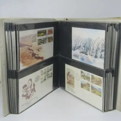 First Day Cover album with about 140 items South Africa and Africa