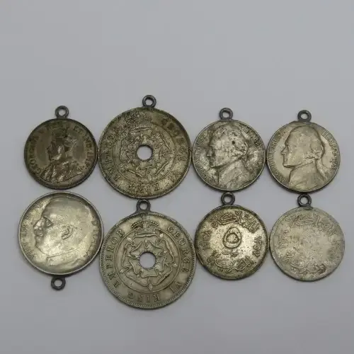 Lot of 8 coins made into pendants - Some silver in here