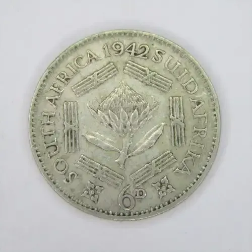 1942 SA Union 6d Sixpence - badly cracked die mark at George 5`s neck