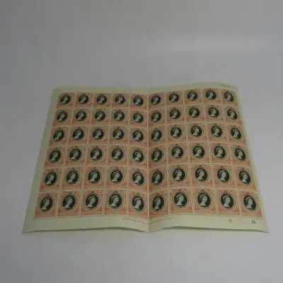 Kenya Uganda and Tanganyika Full page of 20 cents coronation of Queen Elizabeth with faults