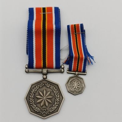 SANDF Tshumelo Ikatelaho medal with miniature #2230