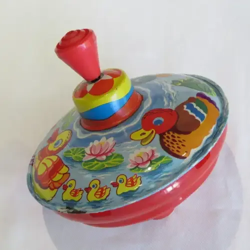 Vintage tinplate and plastic spin top - Made in Western Germany