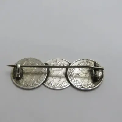 Antique sweetheart brooch made of 3 Victorian silver 3 pence coins