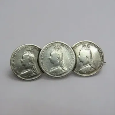 Antique sweetheart brooch made of 3 Victorian silver 3 pence coins