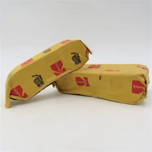 2 Kodak cassette spools - small and large in foil unused