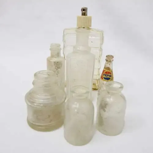 Lot of 7 vintage glass bottles