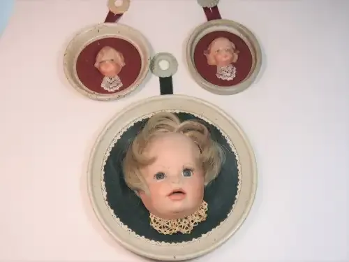 Set of 3 wall hanging baby faces