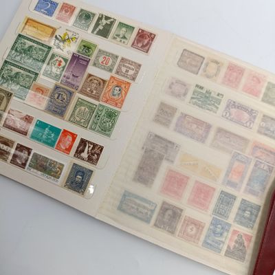 18 Page stamp world album with about 440 mint stamps - unchecked