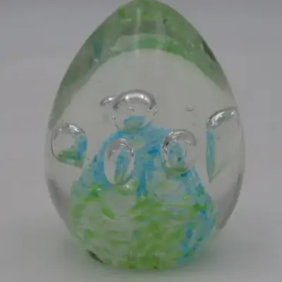 Handmade glass paperweight with bubbles design
