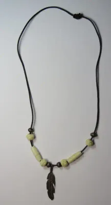 Ethnic necklace with silver feather and bone beads