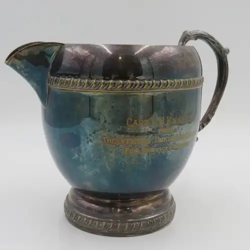 EMESS Silverplate on brass water jug presented to Captain LH Knaggs