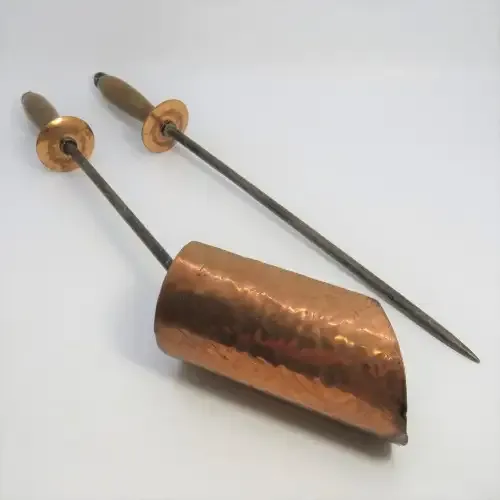 Pair of vintage fire place tools