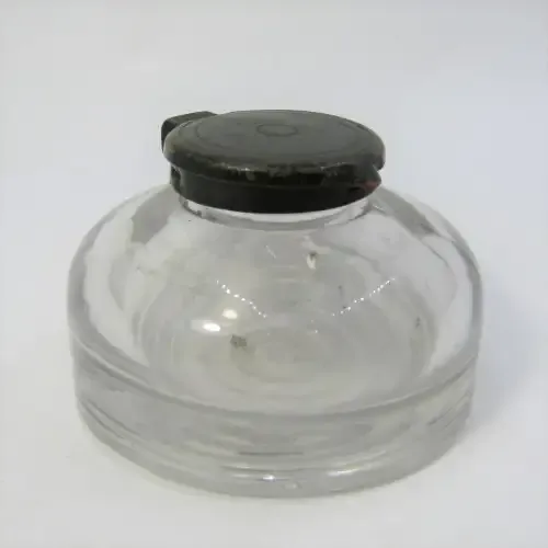Vintage glass ink well with lid