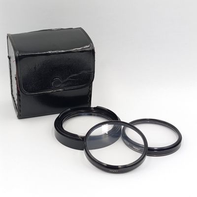 Nikkor and Toshiba lens covers / glare covers 52mm in leatherette box
