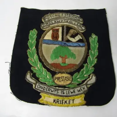 Vintage Potchefstroomse Oderwys Kollege cricket blazer badge