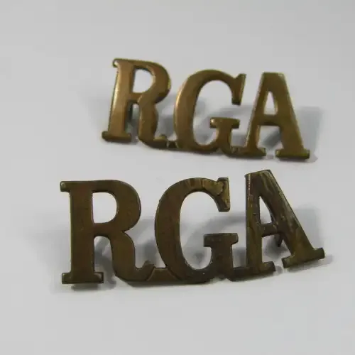 Pair of Royal Garrison Artillery shoulder title