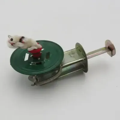 Vintage tin mechanical cat spinner
