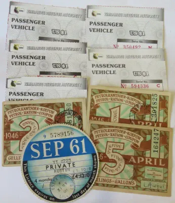 Lot of vehicle licenses, tokens and coupons