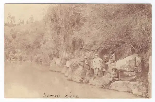 Postcard - Six men posing at Kabusie River - unused