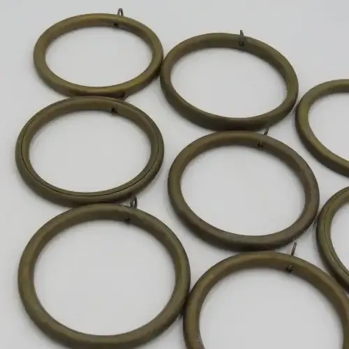 Lot of 9 vintage brass curtain rings
