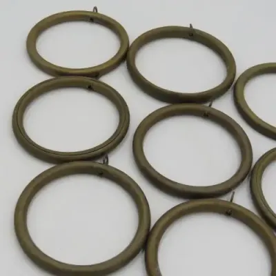 Lot of 9 vintage brass curtain rings