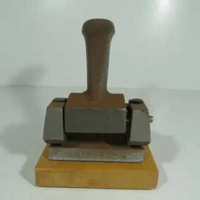 Vintage cast iron paper punch - 2 holes