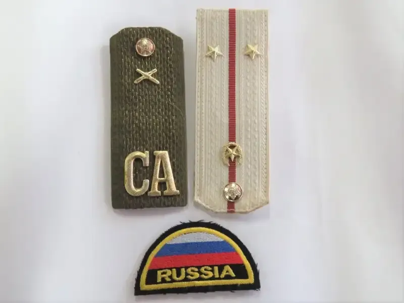Lot of Russian Army epaulettes and badge