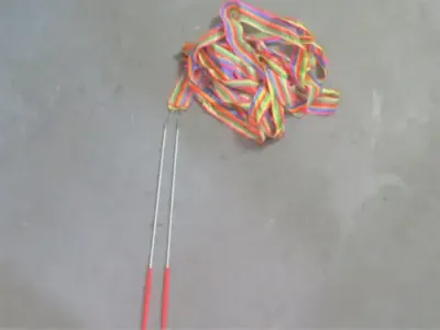 Pair of cheerleader dance ribbons with grip sticks