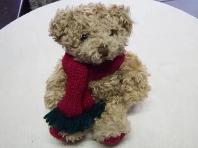 Commonwealth plush teddy bear with scarf