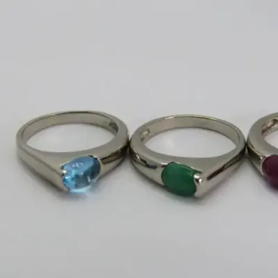 Costume lot of 3 silver look-alike rings with different color stones - Size l