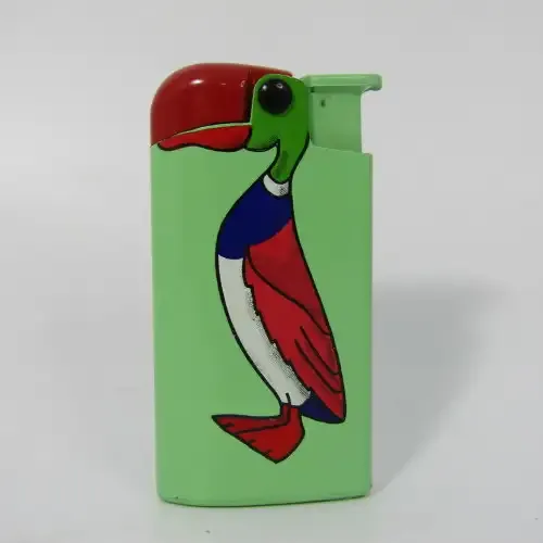 Vintage Bird motif pocket lighter - working