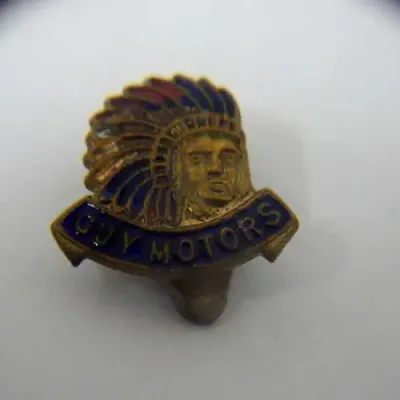 Guy motors button hole badge
