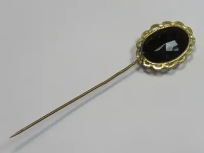 Vintage hat pin with red stone