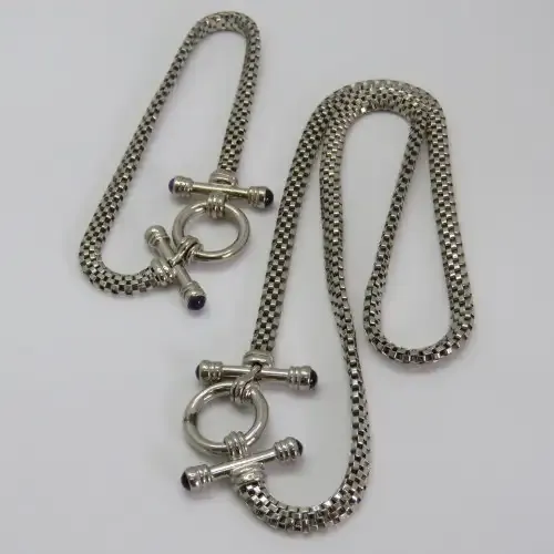 Costume set with silver look-alike necklace and bracelet - Necklace length 45 cm (open)