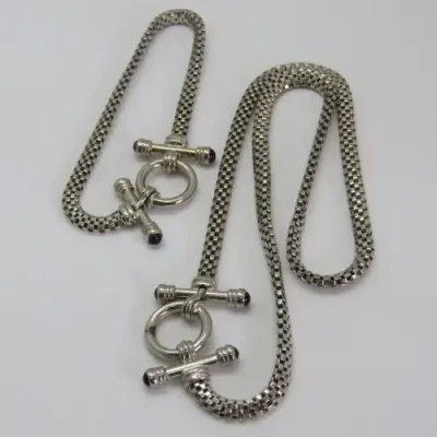 Costume set with silver look-alike necklace and bracelet - Necklace length 45 cm (open)