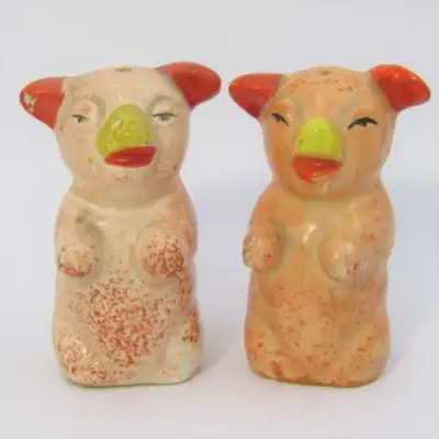 Pair of vintage porcelain pig salt and pepper shakers