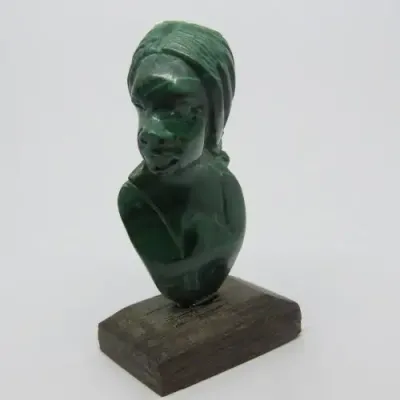 Malachite bust carving on wooden base