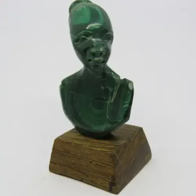 Malachite bust carving on wooden stand